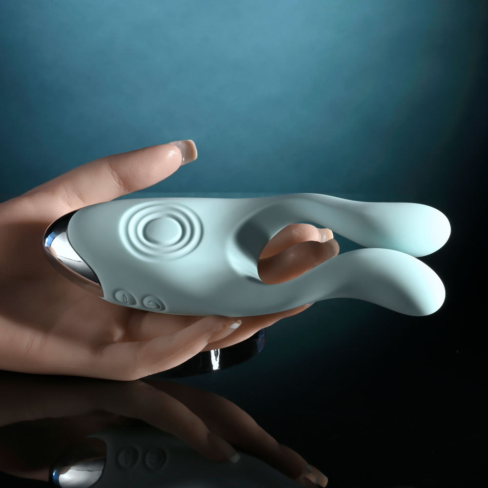 Evolved Couples Therapy teal three-motor couples vibrator with flexible arms and tapping base