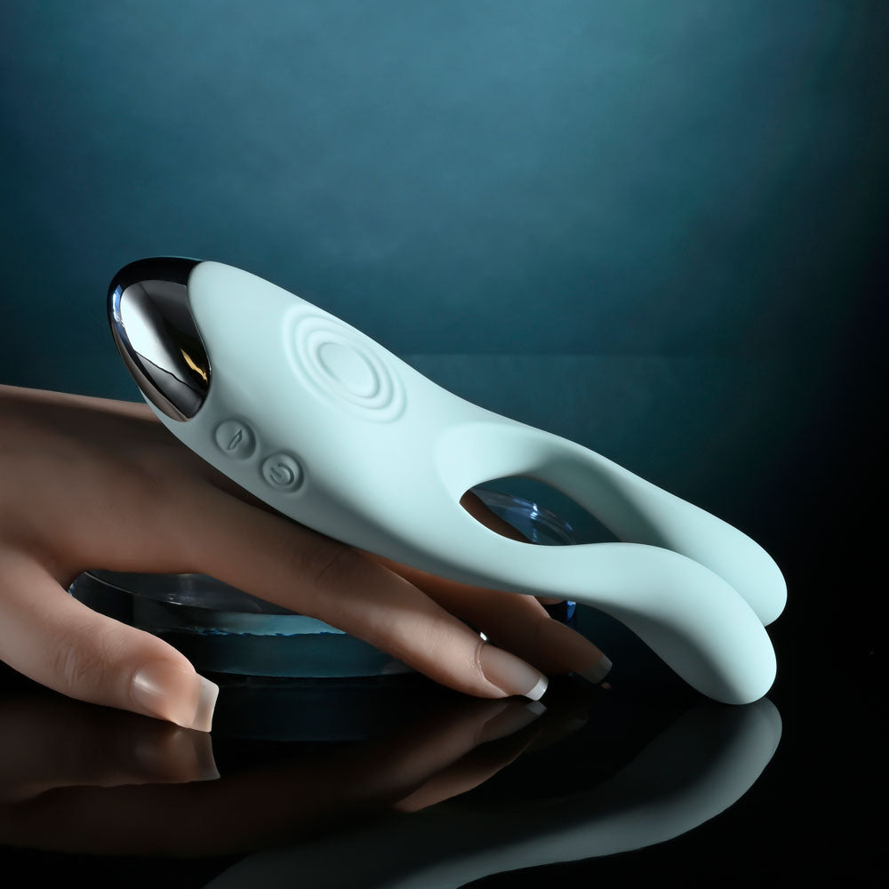 Evolved Couples Therapy teal three-motor couples vibrator with flexible arms and tapping base