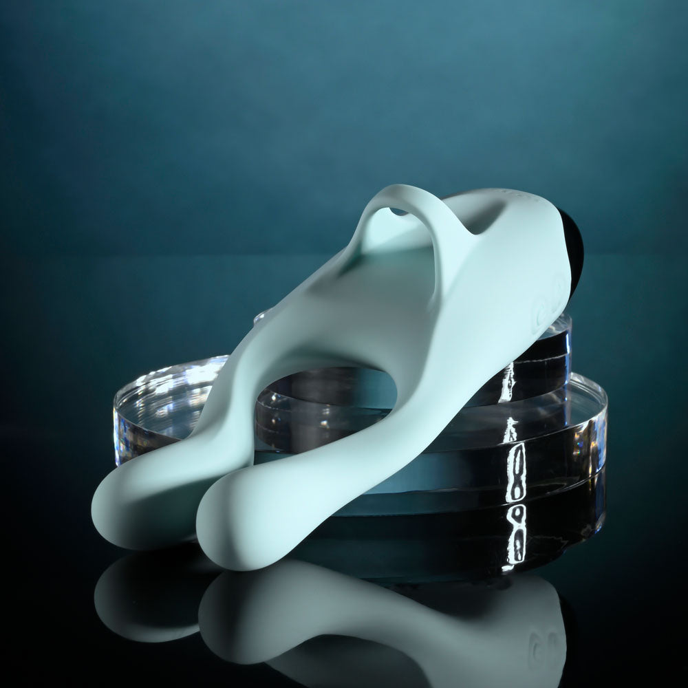 Evolved Couples Therapy teal three-motor couples vibrator with flexible arms and tapping base