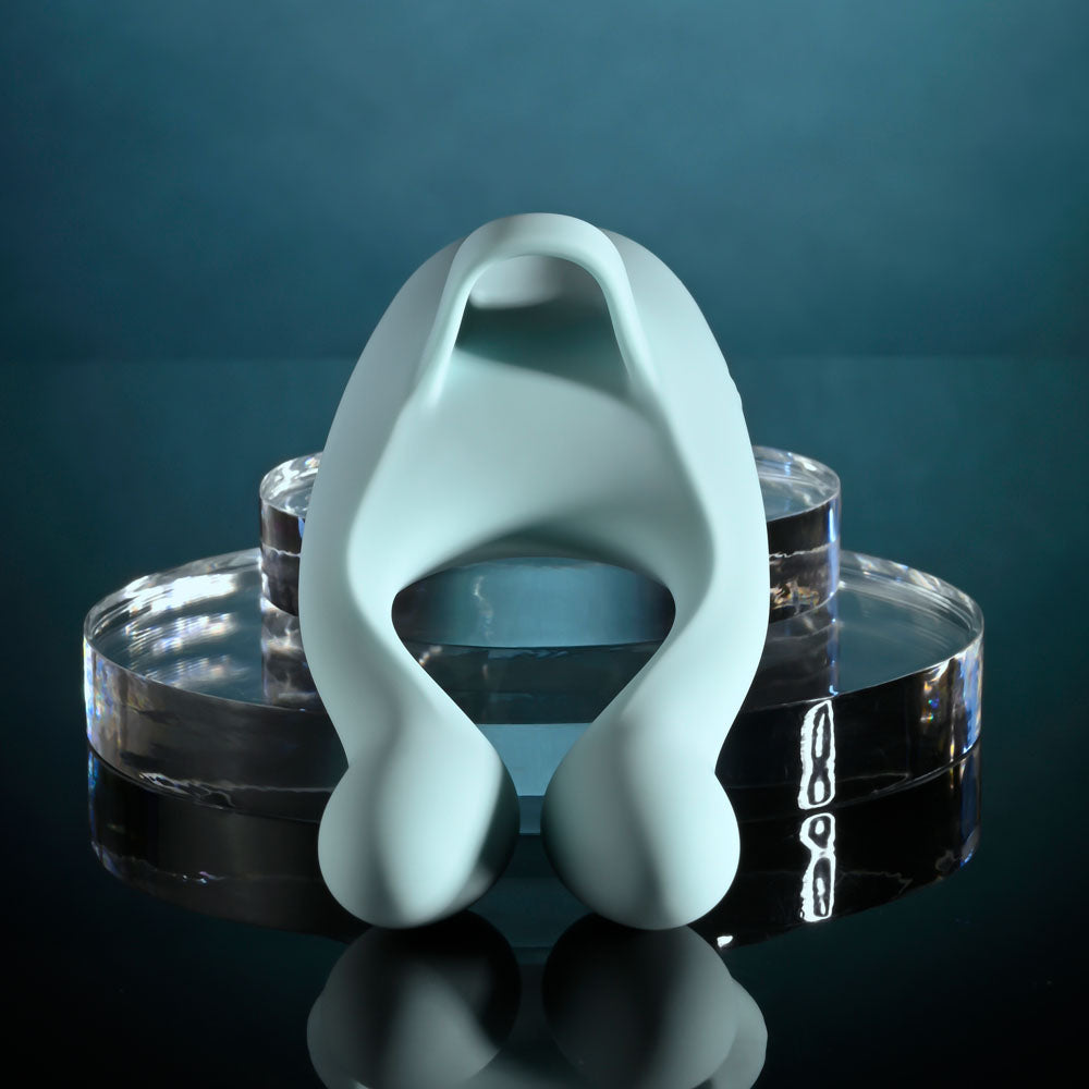 Evolved Couples Therapy teal three-motor couples vibrator with flexible arms and tapping base