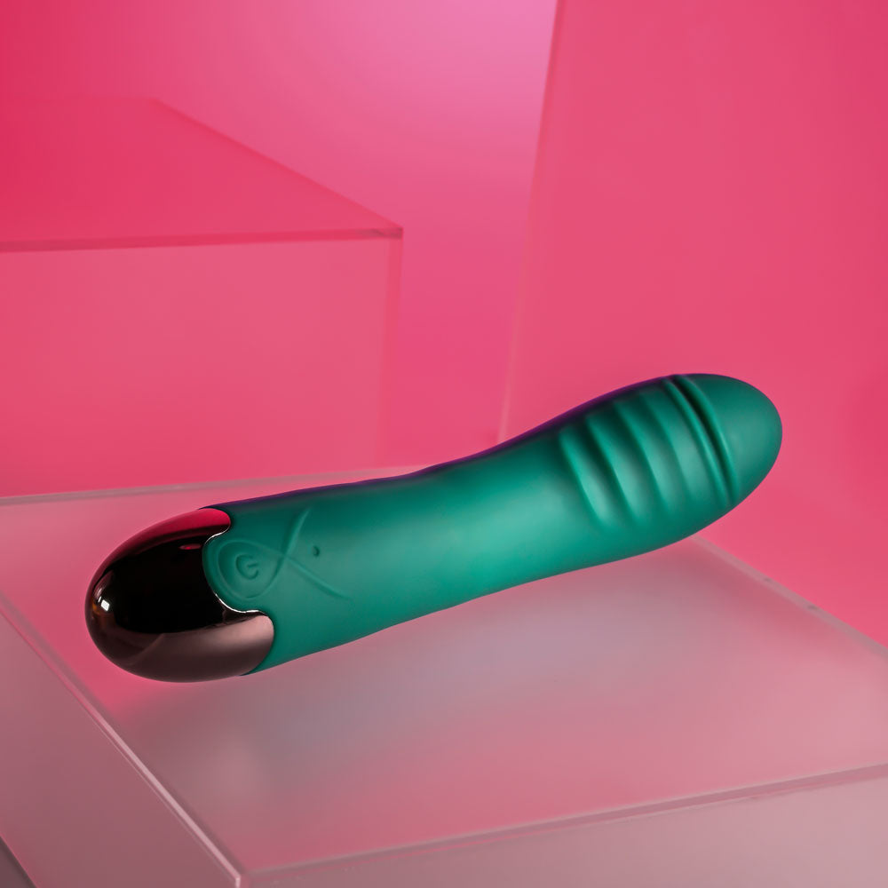 Pirouette green rechargeable twirling vibrator with textured silicone shape