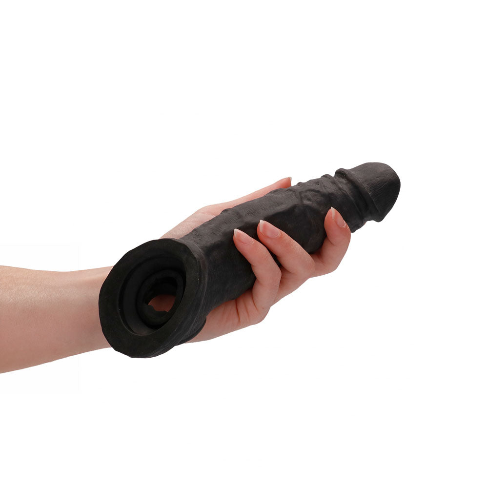 RealRock realistic penis extension sleeve with ringed opening in dark tone — product detail