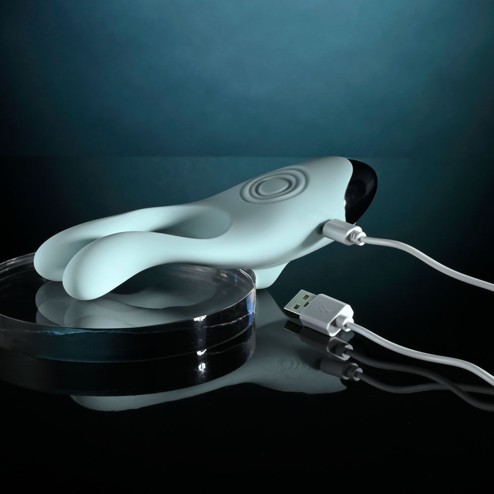 Evolved Couples Therapy teal three-motor couples vibrator with flexible arms and tapping base