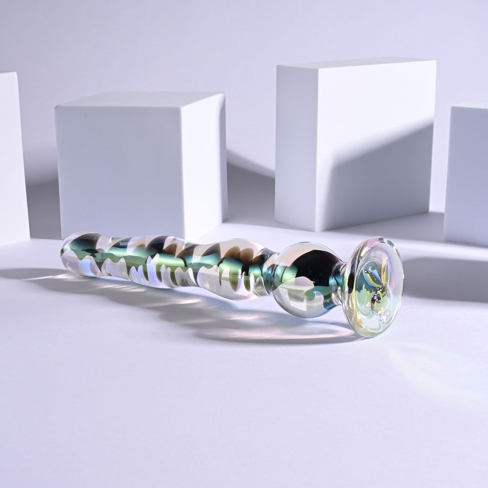 Playboy Jewels Wand glass dildo showing dark interior spiral and iridescent finish