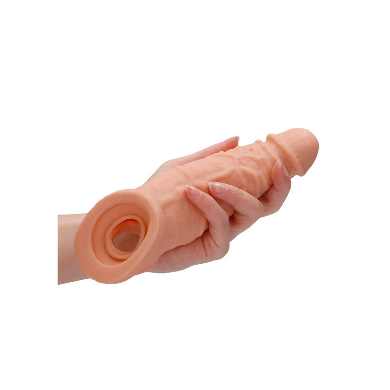 RealRock realistic penis extension sleeve with ringed opening in light tone — product detail