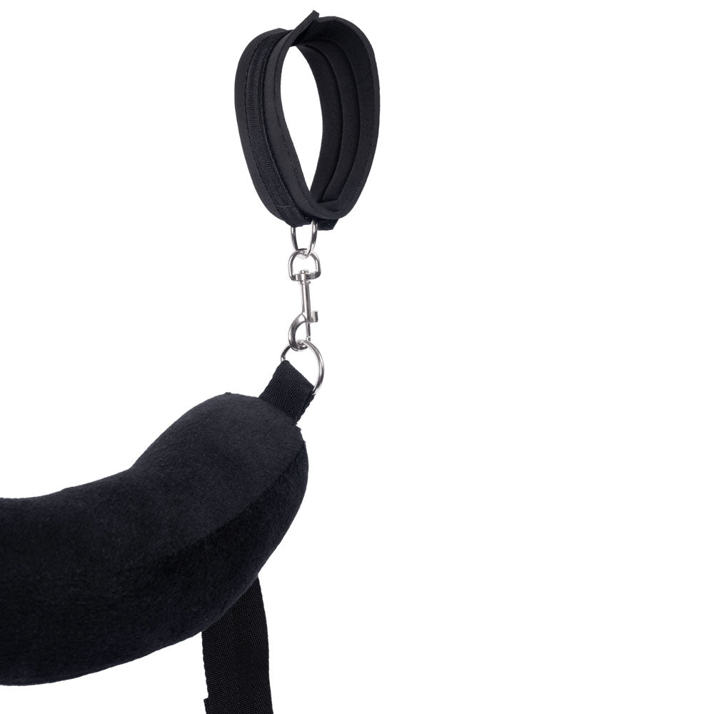 Close-up of a detachable cuff, metal clip and plush support pillow
